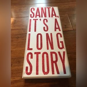 Whimsical sign.  Primatives by Kathy - red glittery letters.